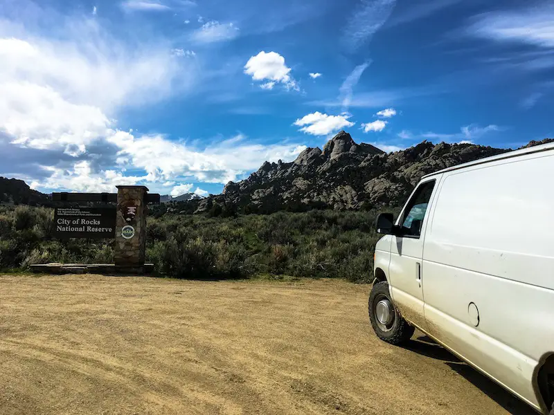 entrance to city of rocks national park with climbers van