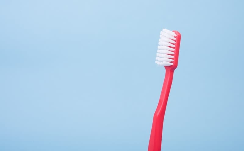 picture of a red toothbrush
