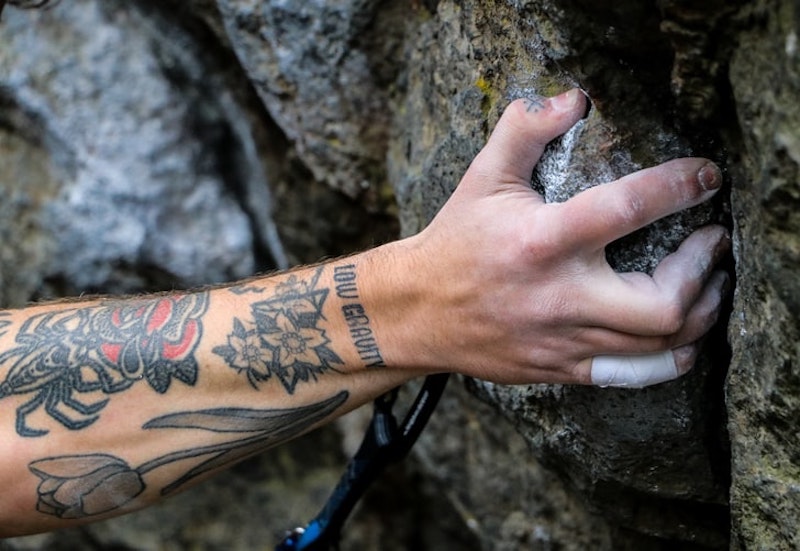 Person showing finger strength