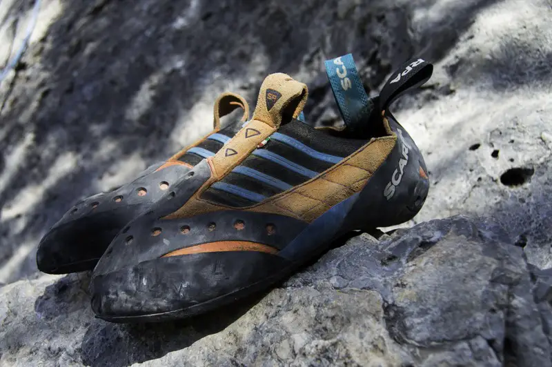 Pair of dirty scarpa Climbing shoes ready to be washed
