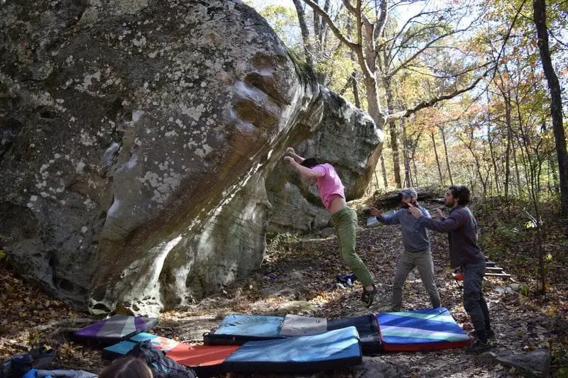 People doing bouldering