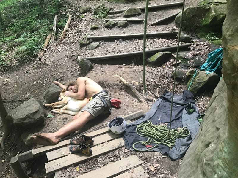 Man lying with his dog
