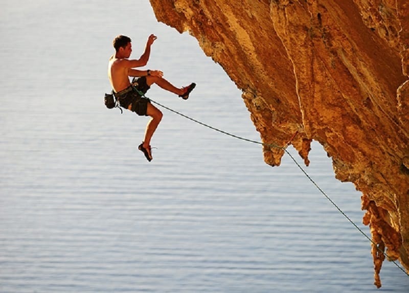 Man climbing rock