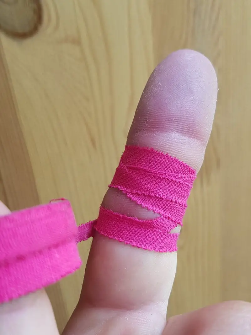 covering finger with tape